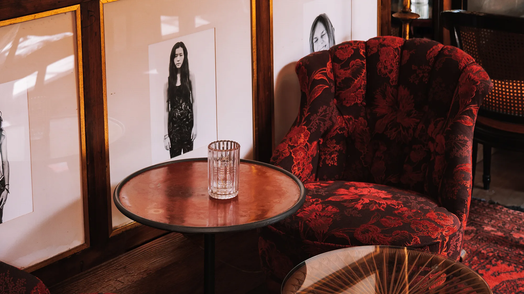 Lounge seating against a portrait wall