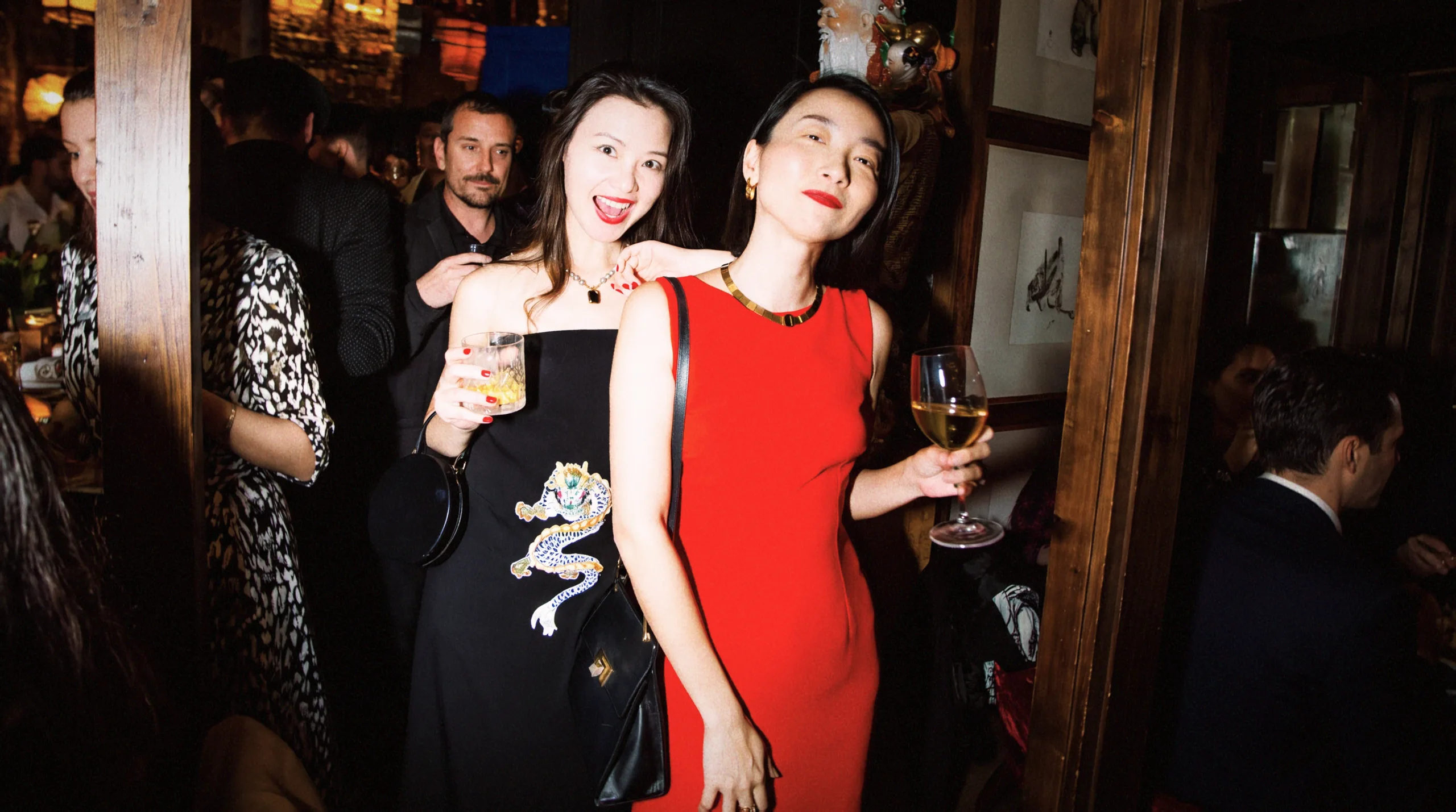 Two guests in evening dress at Boca Grande Barcelona