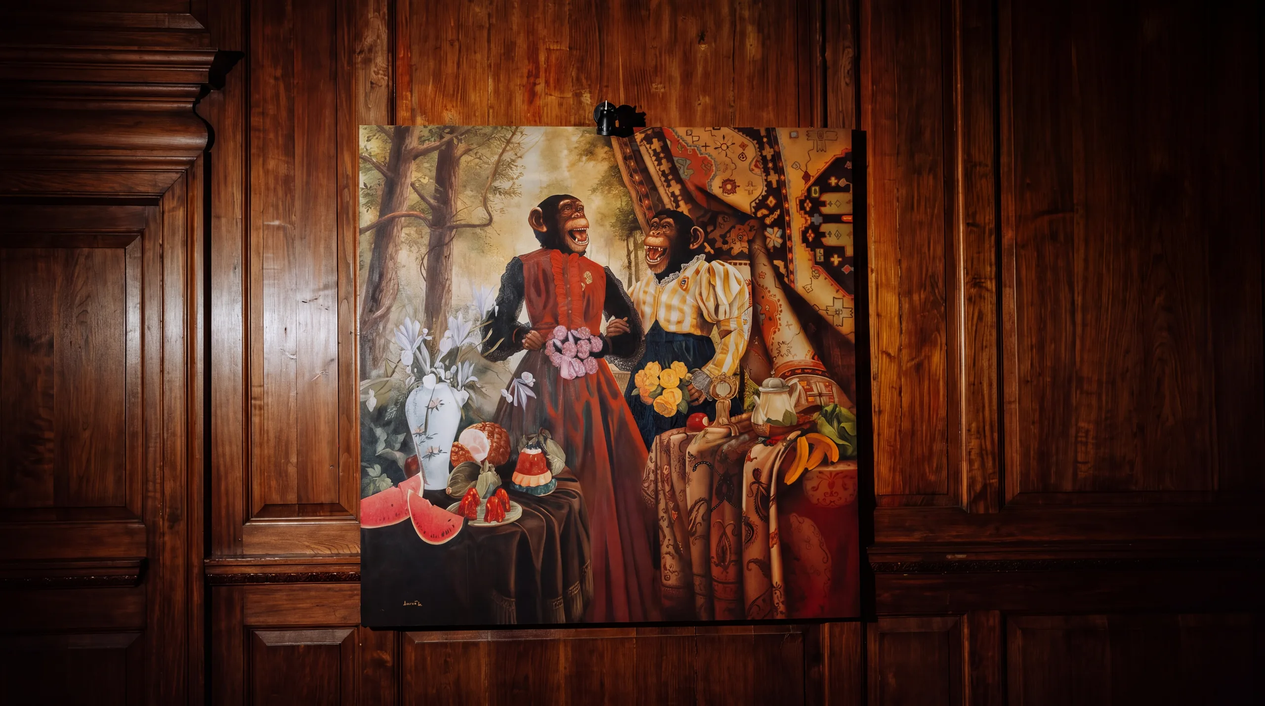 Chimpanzee painting on a wood-panelled wall at Boca Grande